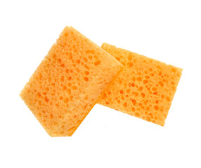 Orange rectangular porous washing sponges isolated on a white background