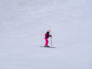 Skier enjoying skiing on the Clabucet ski lope in Predeal Mountain resort in Romania