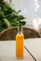 Bottle of Orange juice with cap made from banana leaf, Eco friendly concept 