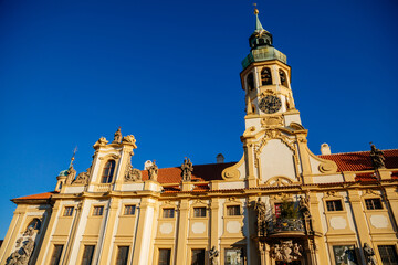 Baroque pilgrim place Loreto Monastery, facade of Prazska Loreta Church of the Nativity of Our...