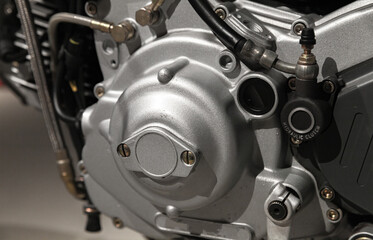 Modern motorcycle engine fragment, close up photo