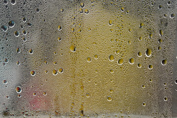 condensation in the form of drops on glass