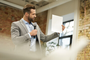 Copy space photo of the businessman looking at the paper