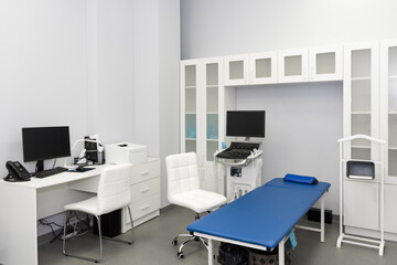 Interior of examination room with ultrasonography machine in hospital laboratory. Modern medical equipment background. Ultra Sound Machine, USG, Sonogram Screening