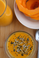 pumpkin cream soup as starter with seeds topping