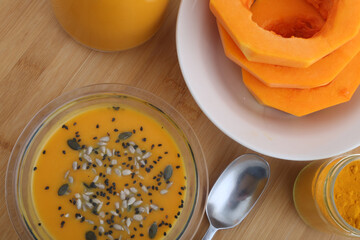 pumpkin cream soup as starter with seeds topping