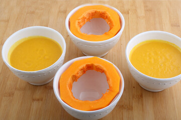 pumpkin cream soup as starter with seeds topping