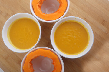 pumpkin cream soup as starter with seeds topping