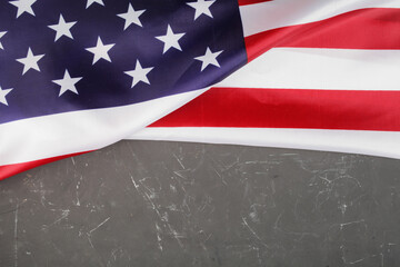 USA flag on a dark concrete background, place for your text.
