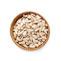 Bowl with peeled sunflower seeds on white background
