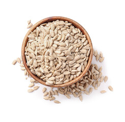 Bowl with peeled sunflower seeds on white background