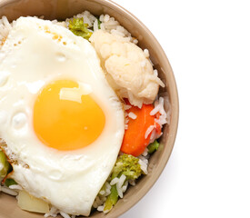 Bowl with tasty egg, vegetables and rice on white background