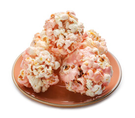 Plate with tasty popcorn balls on white background