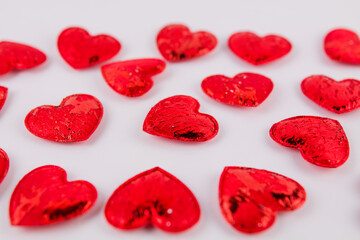 background of red hearts on a white background for the feast of lovers Valentine's day February 14