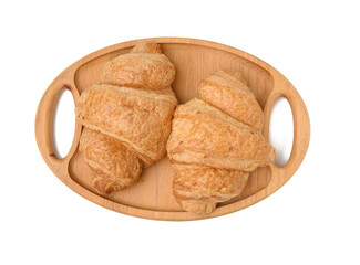 two baked croissants lie on a wooden tray, food isolated on white background, top view