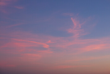 blue sky, with clouds, in sunset