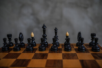 Chess table with figures in a row with copy space