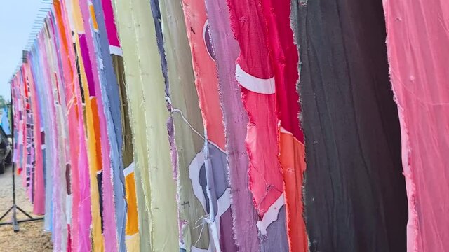 Colorful Malaysian Corak Batik Cloth Traditionally Worn As Clothing Drying Under The Sun - Close up