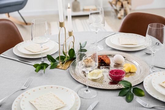 Passover Seder Plate With Traditional Food On Served Table