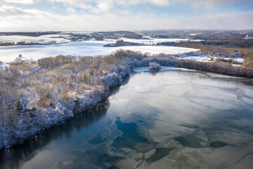 Aerial landscape of the frozen lake in Poland at winter