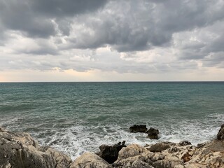 Dark rainy clouds at the sea