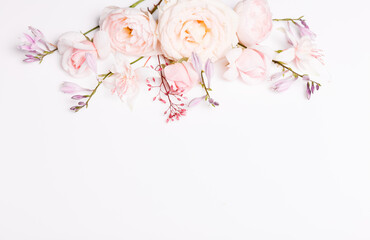 Festive flower composition on the white background. Overhead view