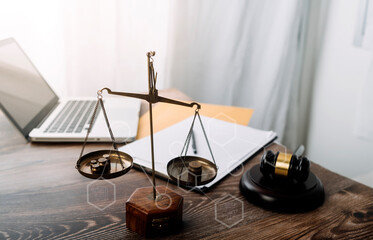 Business and lawyers discussing contract papers with brass scale on desk in office. Law, legal...