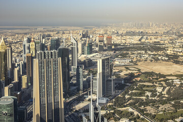 Aerial view of Dubai from Burj Khalifa - tallest skyscraper in the world. DUBAI, United Arab Emirates. 