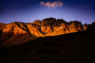 Sunset rays over the mountain