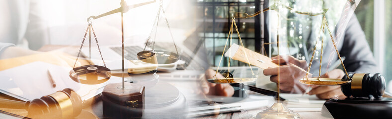 Business and lawyers discussing contract papers with brass scale on desk in office. Law, legal services, advice, justice and law concept picture with film grain effect