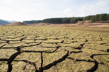 The drought bottom of the an empty dam in Bulgaria. Hot weather and climate changes makes the dam almost empty in 2021. Climate disaster.