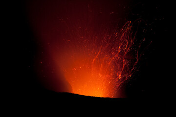 Liquid hot magma erupting from within Mt Yasur's crater on Tanna Island, Vanuatu. Projectile lava is far more visible by night.
