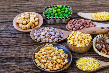 The beans seed on wooden  background,.