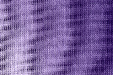 Purple fabric texture with shadows. Purple background for design.