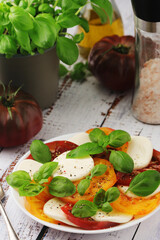 A plate with Italian salad caprese
