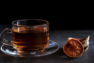 Matum tea. Bael fruit tea and slices of dried bael fruit