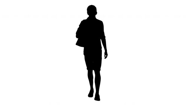 Silhouette Handsome smiling man in white shirt walking with a bag on his shoulder.
