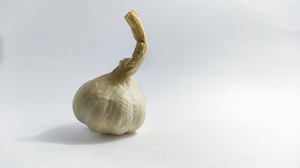 fresh garlic on a white isolated surface