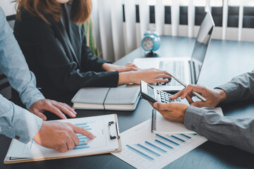 Group of businesspeople busies discussing financial Business people brainstorming at office desk,...