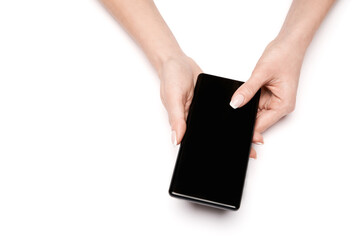 Top view of woman holding smartphone isolated on white background