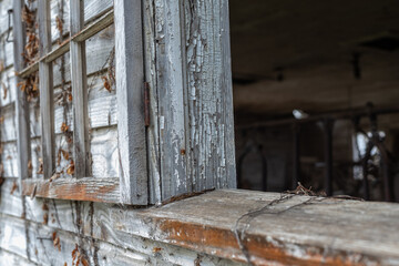 Window of abandoned, vintage dairy barn