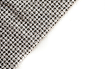 Classic black and white plaid fabric or tablecloth on white background