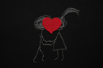 Chalk drawing man and a girl are kissing. Blackboard or chalkboard background. Valentines day,...