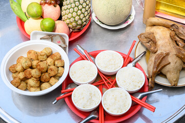Chinese New Year, a celebration of ancestors and gods with food and drink