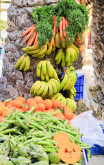 Vegetables and fruits for sale at an ecological market stall