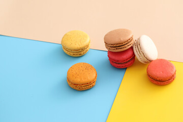 Colorful macarons isolated in pastel background