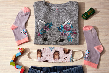 mask during coronavirus or infection or allergy. Medicine instruments, tablets and other medicines on a table. Top view. New normal at work