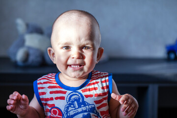 Portrait of a boy close-up, emotions of anger and resentment
