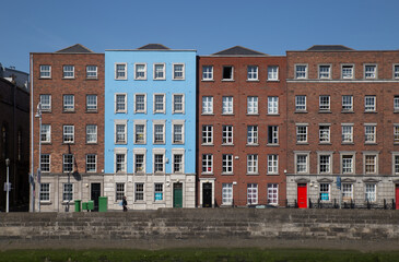 Fototapeta premium Industrial houses along the Liffey in Dublin