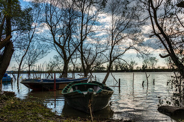 Old Fisherboats on Shore of River Po in Winter, Italy
